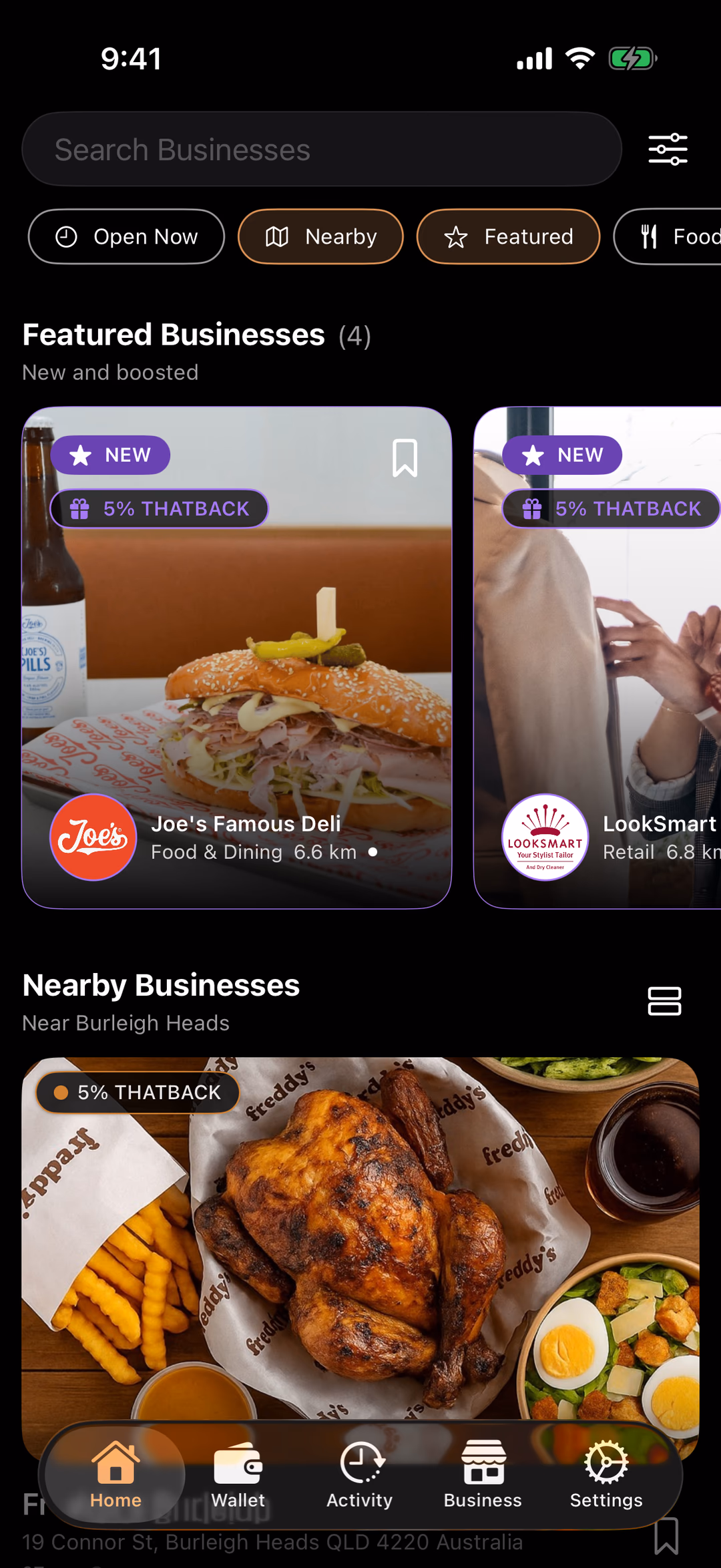 The THAT app's Home tab: a search bar, filter chips, featured businesses and nearby businesses