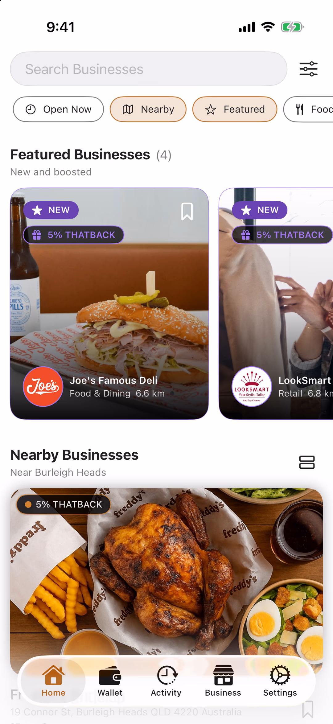 The THAT app's Home tab: a search bar, filter chips, featured businesses and nearby businesses