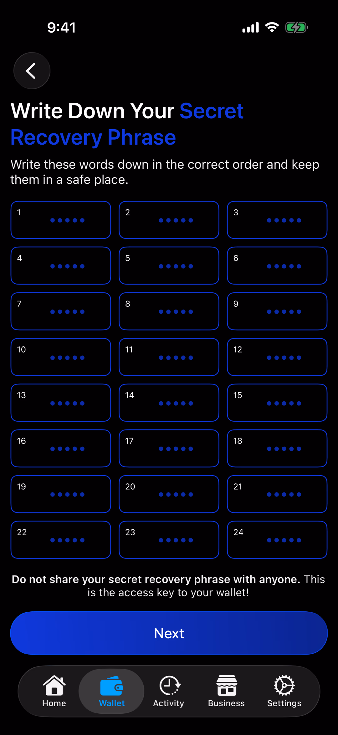 The recovery phrase screen: 24 numbered words (hidden in this picture) and a Next button