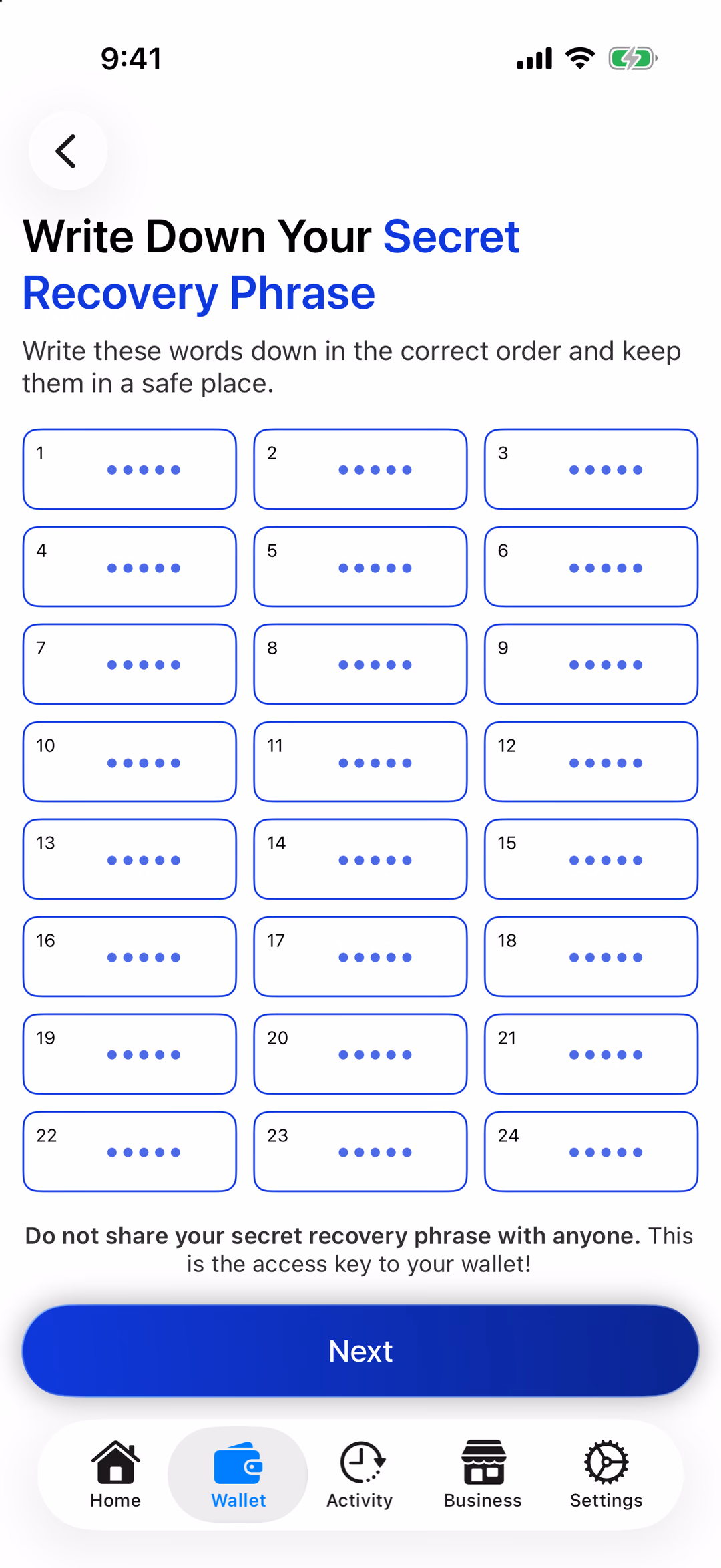 The recovery phrase screen: 24 numbered words (hidden in this picture) and a Next button