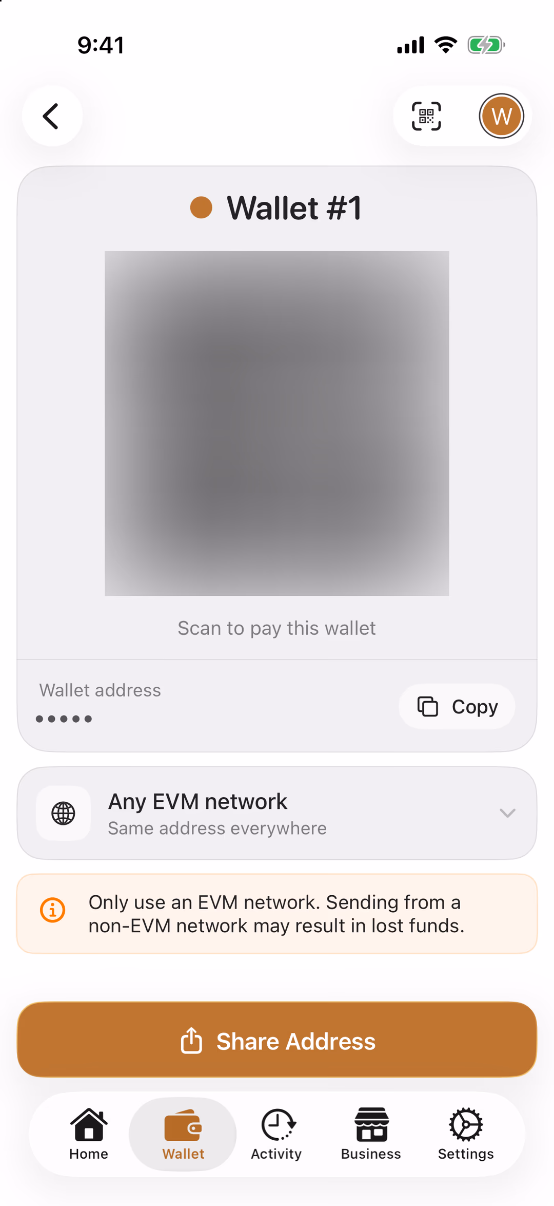 The Receive screen with the Copy button highlighted; the QR code and address are hidden in this picture