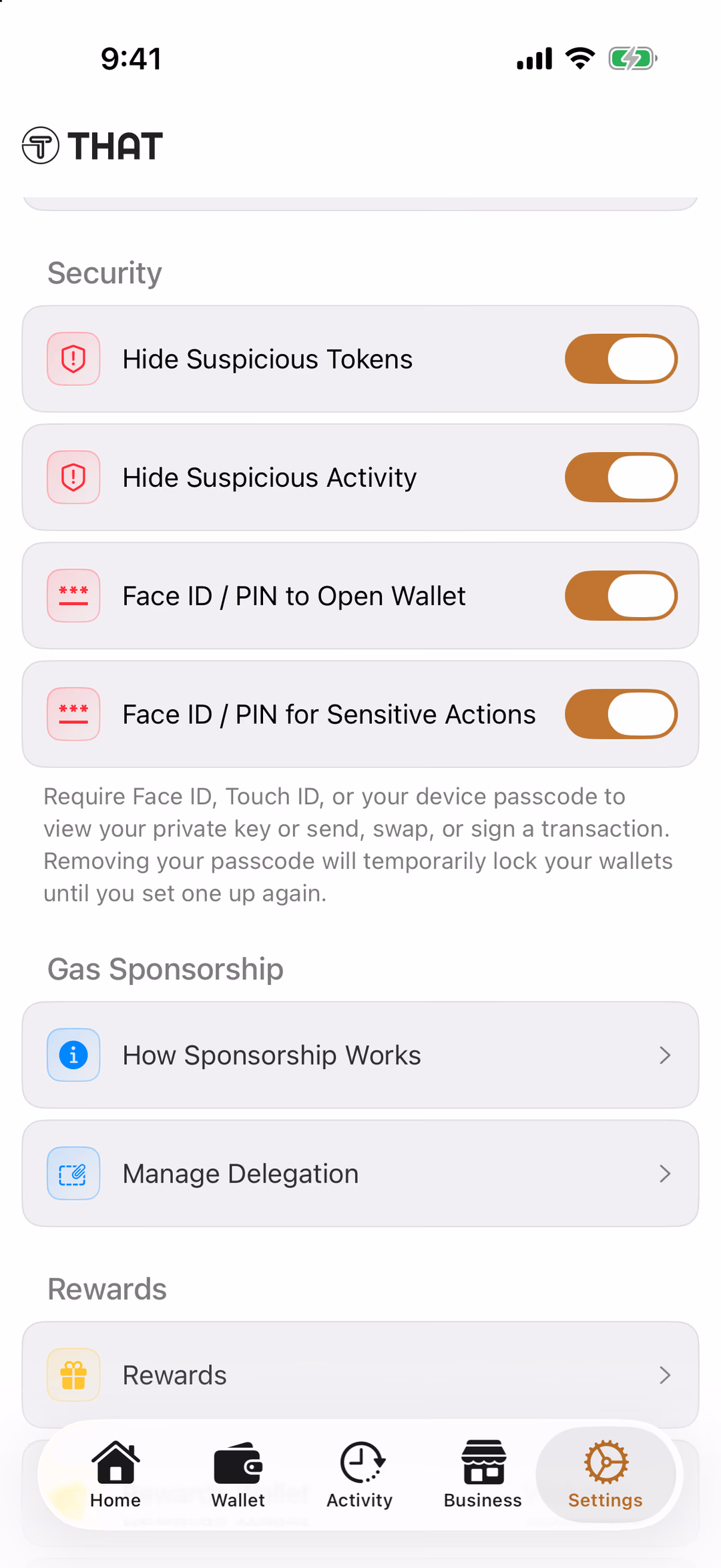The THAT app's Settings tab at the Security section: Hide Suspicious Tokens, Hide Suspicious Activity, Face ID / PIN to Open Wallet and Face ID / PIN for Sensitive Actions, all switched on